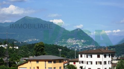 Large building plot with open views upon lovely hills and mountains